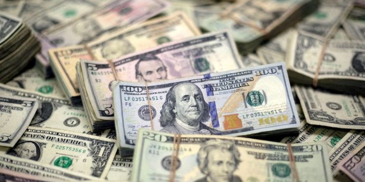 Stocks stumble, dollar and gold rise as traders weigh US rates, election